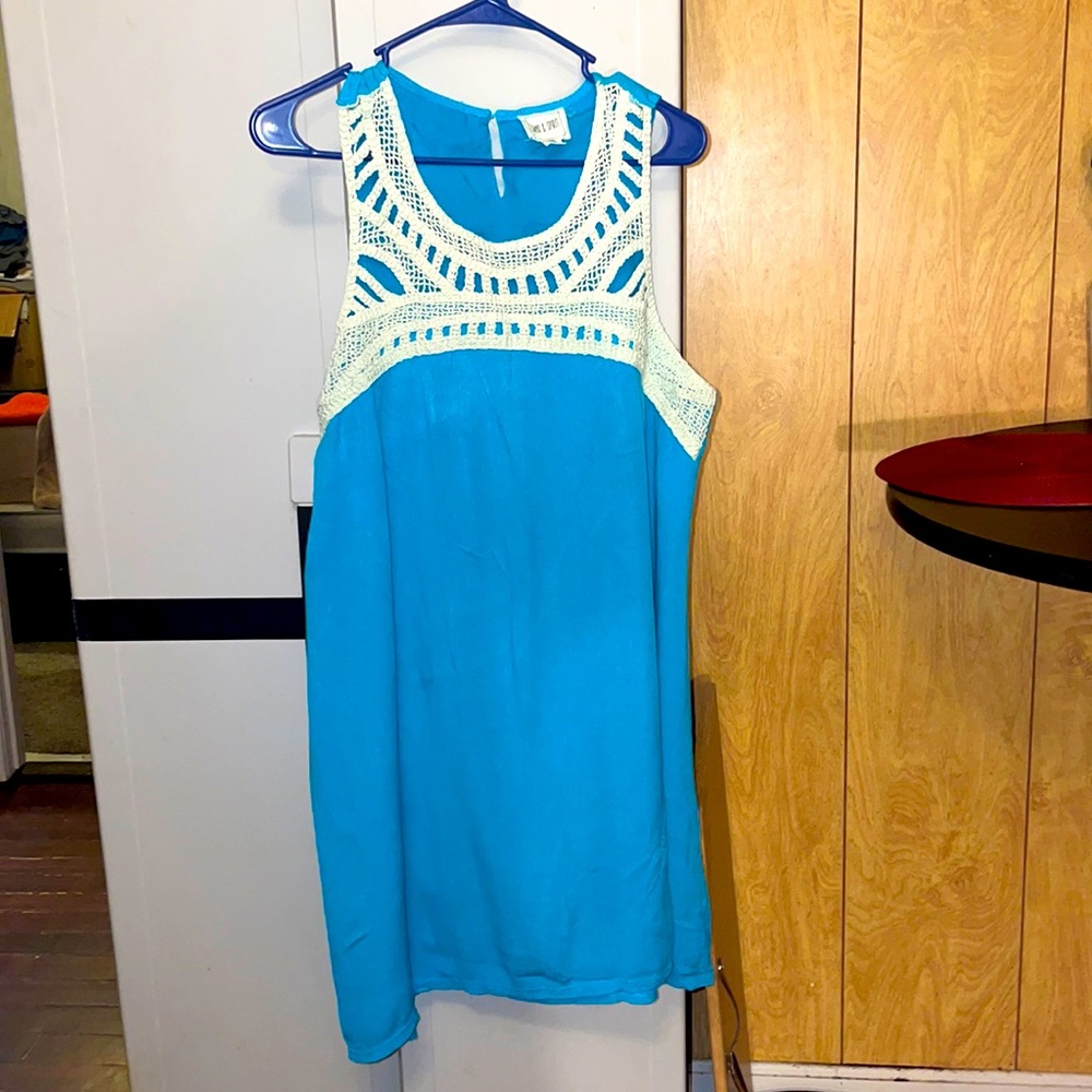 Gently Used turquoise lined swing sleeveless dress w/crochet neck n yoke